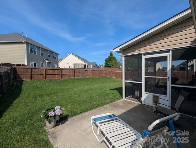 view of yard with a fenced backyard and a patio area