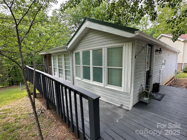 127 Hummingbird Cir, New London, NC 28127 - view of property exterior with a wooden deck