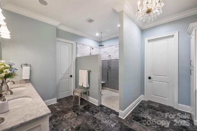 bathroom featuring marble finish floor, walk in shower, a sink, and an inviting chandelier