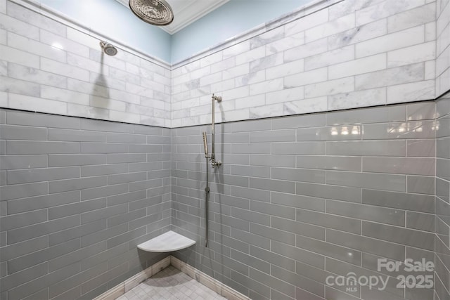 bathroom featuring tiled shower