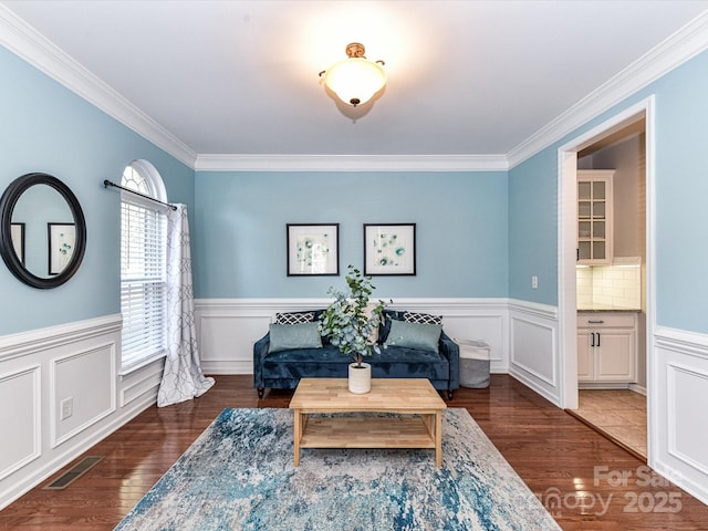 6005 Abergele Ln, Matthews, NC 28104 - sitting room with visible vents, ornamental molding, and wood finished floors