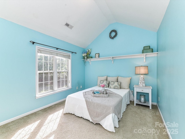 6005 Abergele Ln, Matthews, NC 28104 - carpeted bedroom featuring baseboards, vaulted ceiling, and visible vents