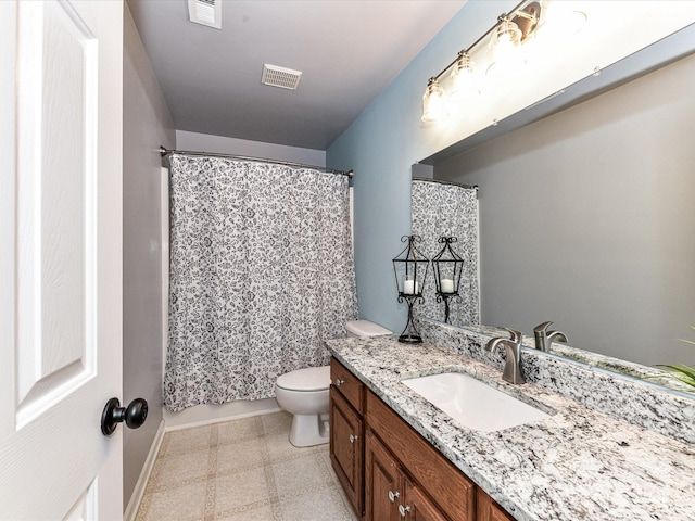 6005 Abergele Ln, Matthews, NC 28104 - full bath with visible vents, tile patterned floors, toilet, and vanity