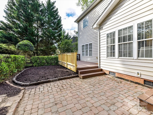 6005 Abergele Ln, Matthews, NC 28104 - view of patio / terrace with a wooden deck and fence