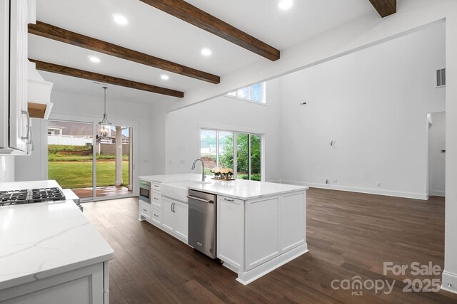 6712 Cove Ln, Sherrills Ford, NC 28673 - kitchen featuring appliances with stainless steel finishes, white cabinetry, dark wood-style floors, beamed ceiling, and light stone countertops