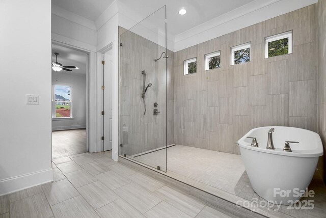 6712 Cove Ln, Sherrills Ford, NC 28673 - full bathroom featuring tiled shower, plenty of natural light, and a freestanding tub
