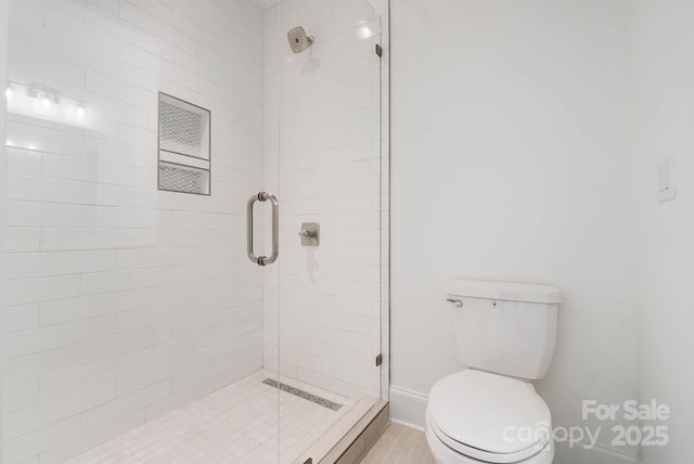 6712 Cove Ln, Sherrills Ford, NC 28673 - full bathroom with toilet, a shower stall, and baseboards