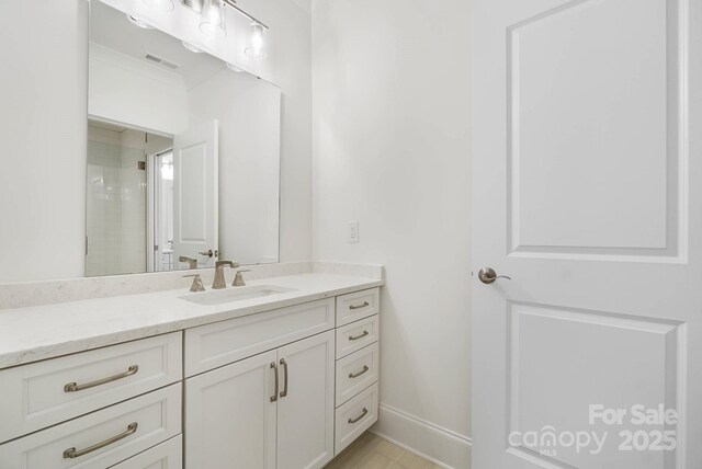 6712 Cove Ln, Sherrills Ford, NC 28673 - full bathroom featuring vanity and baseboards