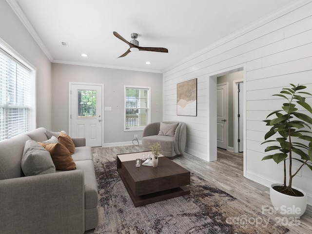1508 Pennsylvania Ave, Hendersonville, NC 28739 - living area featuring wood finished floors, ornamental molding, a ceiling fan, wood walls, and recessed lighting