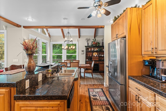 300 Falls View Dr, Lake Toxaway, NC 28774 - kitchen featuring stainless steel fridge with ice dispenser, tile counters, light wood-style flooring, a center island with sink, and plenty of natural light