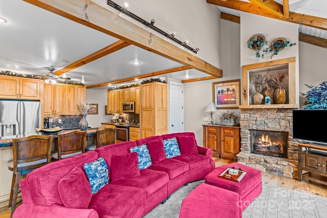 300 Falls View Dr, Lake Toxaway, NC 28774 - living room featuring light wood-type flooring, beamed ceiling, ceiling fan, a fireplace, and recessed lighting
