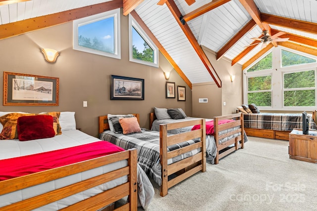 300 Falls View Dr, Lake Toxaway, NC 28774 - carpeted bedroom with multiple windows, beamed ceiling, high vaulted ceiling, and a ceiling fan