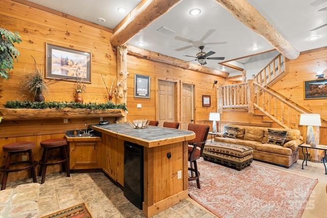 300 Falls View Dr, Lake Toxaway, NC 28774 - kitchen with tile countertops, wooden walls, a ceiling fan, fridge, and recessed lighting
