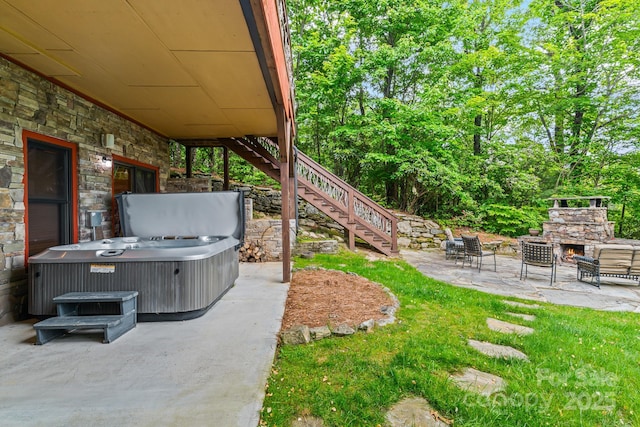 300 Falls View Dr, Lake Toxaway, NC 28774 - view of yard with a hot tub, a patio, stairway, and an outdoor stone fireplace
