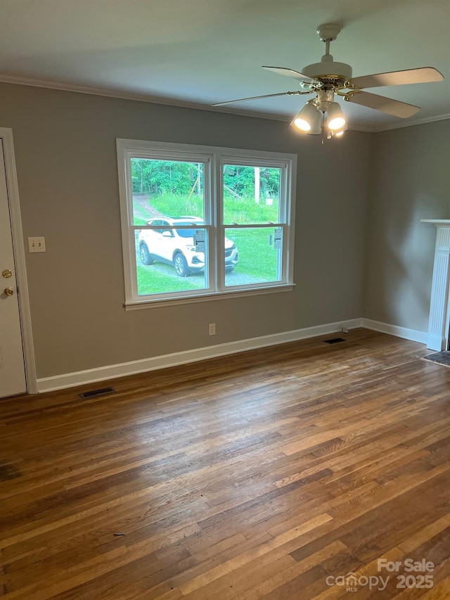 755 Victory Grove Church Rd, Lincolnton, NC 28092 - empty room with crown molding, wood-type flooring, ceiling fan, and baseboards