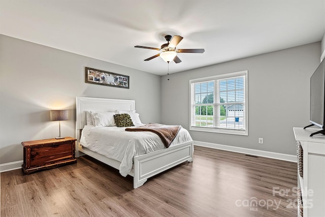 3615 Kimber Ln, Sherrills Ford, NC 28673 - bedroom featuring baseboards, a ceiling fan, wood finished floors, and visible vents
