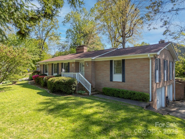 151 Fernwood Dr, Rutherfordton, NC 28139 - single story home featuring a chimney, brick siding, and a front lawn