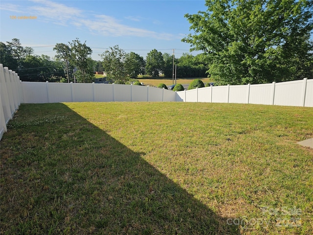 106 Calderdale Ln, Charlotte, NC 28262 - view of yard featuring a fenced backyard