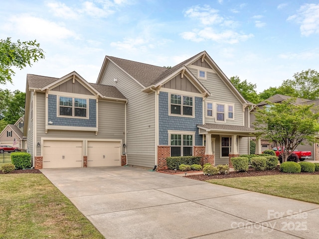 craftsman-style home with concrete driveway, board and batten siding, brick siding, a front yard, and a garage