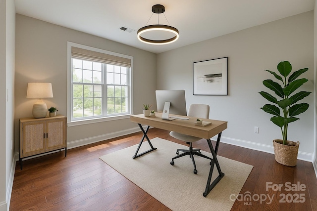 4926 Trayton Ave, Gastonia, NC 28056 - office area with baseboards, dark wood finished floors, and visible vents