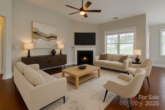 4926 Trayton Ave, Gastonia, NC 28056 - living room with visible vents, lofted ceiling, and wood finished floors