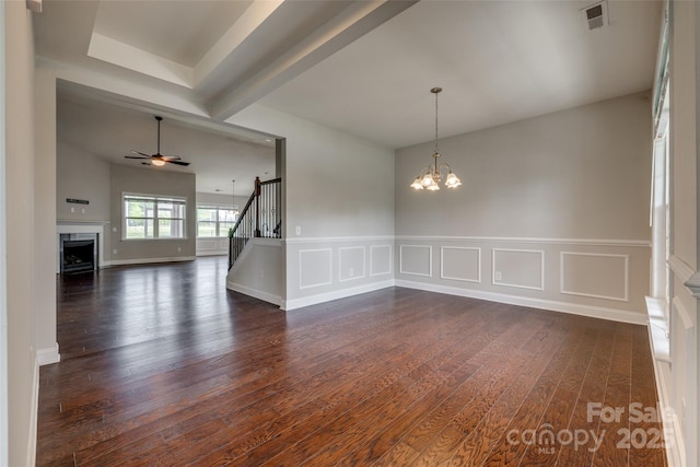 4926 Trayton Ave, Gastonia, NC 28056 - interior space with visible vents, a fireplace, stairway, dark wood finished floors, and ceiling fan with notable chandelier