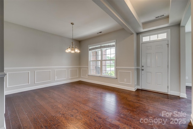 4926 Trayton Ave, Gastonia, NC 28056 - entrance foyer featuring visible vents, a chandelier, and dark wood-style floors