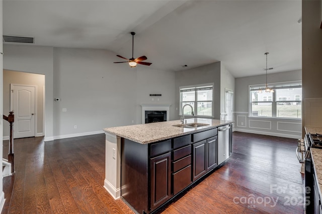4926 Trayton Ave, Gastonia, NC 28056 - kitchen featuring a sink, appliances with stainless steel finishes, ceiling fan, and dark wood-style flooring