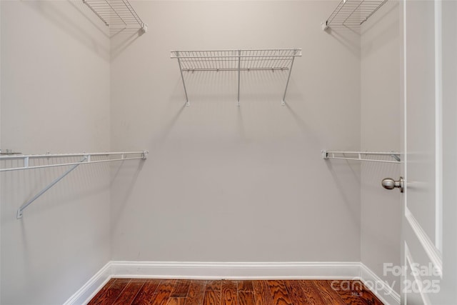 4926 Trayton Ave, Gastonia, NC 28056 - spacious closet featuring dark wood-style flooring