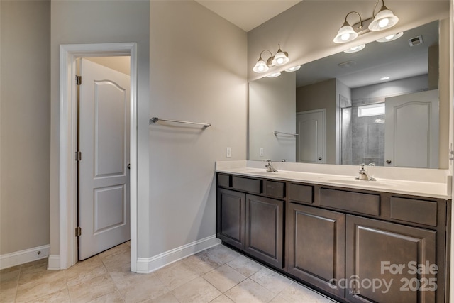 4926 Trayton Ave, Gastonia, NC 28056 - full bathroom with double vanity, tile patterned floors, baseboards, visible vents, and a stall shower