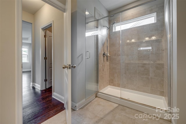 4926 Trayton Ave, Gastonia, NC 28056 - bathroom with baseboards and a stall shower