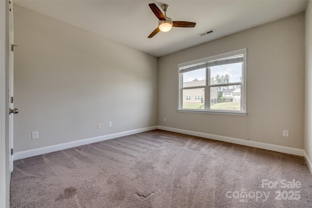 4926 Trayton Ave, Gastonia, NC 28056 - spare room featuring carpet floors, baseboards, a ceiling fan, and visible vents