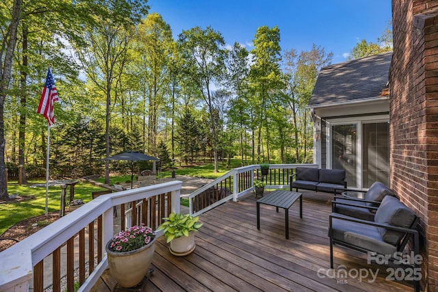 deck featuring an outdoor hangout area