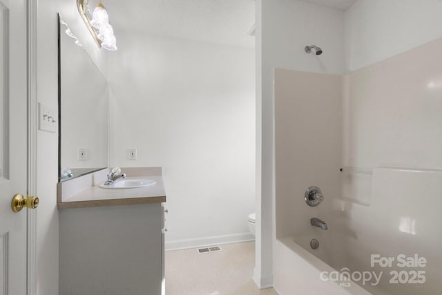 full bathroom featuring vanity, toilet, baseboards, shower / bathing tub combination, and visible vents