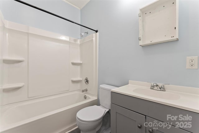 bathroom with toilet, shower / washtub combination, and vanity