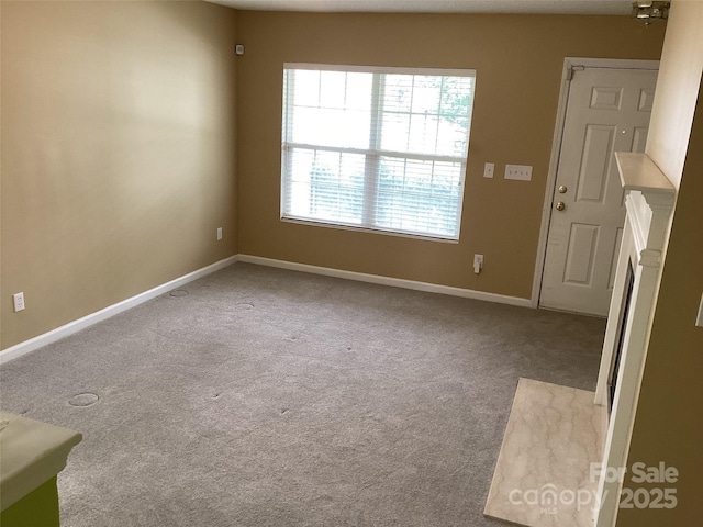 1012 Kings Mountain Ln, Gastonia, NC 28054 - carpeted spare room with baseboards