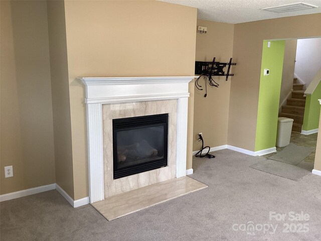 1012 Kings Mountain Ln, Gastonia, NC 28054 - detailed view of carpet flooring, a tiled fireplace, and baseboards