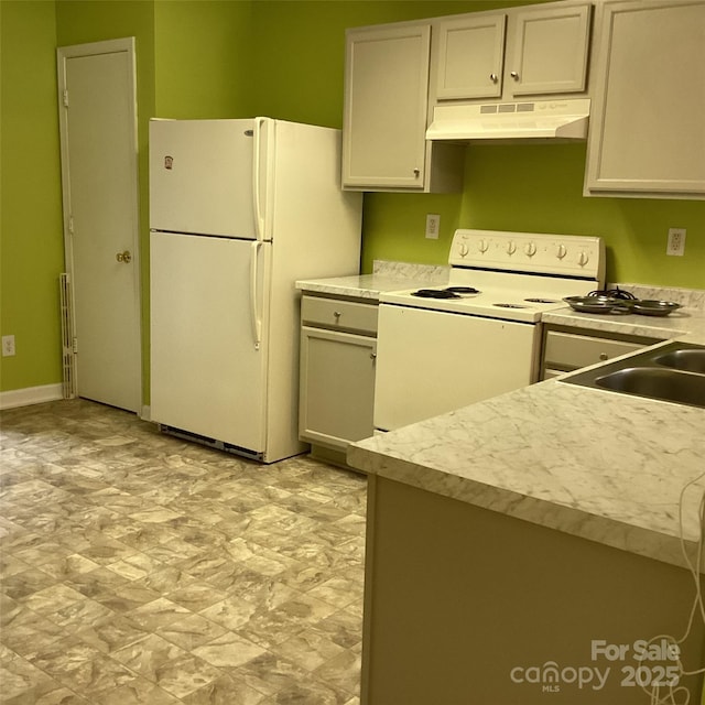 1012 Kings Mountain Ln, Gastonia, NC 28054 - kitchen featuring under cabinet range hood, white appliances, and light countertops