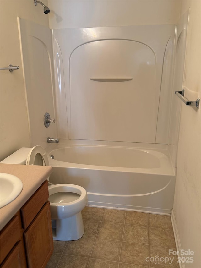 1012 Kings Mountain Ln, Gastonia, NC 28054 - full bathroom featuring toilet, shower / bath combination, vanity, and tile patterned floors