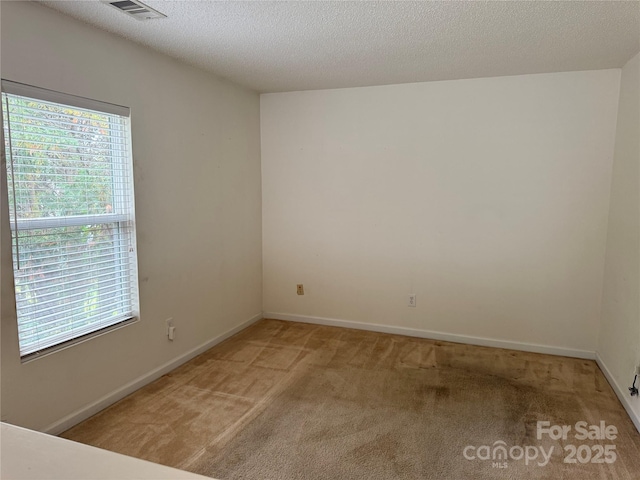 1012 Kings Mountain Ln, Gastonia, NC 28054 - unfurnished room with light colored carpet and baseboards