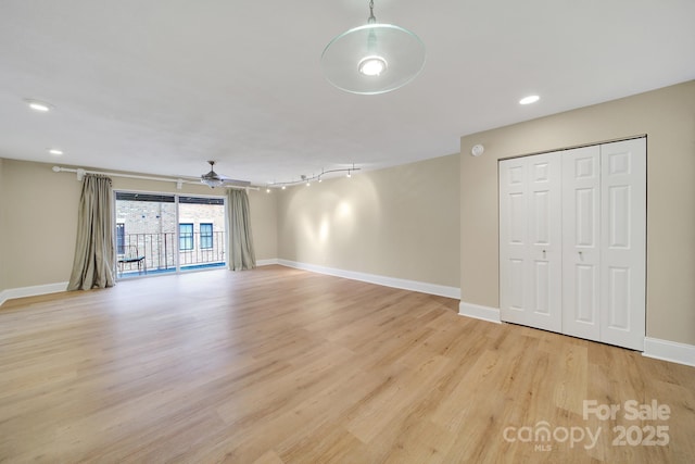 1323 Queens Rd Unit 420, Charlotte, NC 28207 - unfurnished living room with a ceiling fan, light wood finished floors, recessed lighting, and baseboards