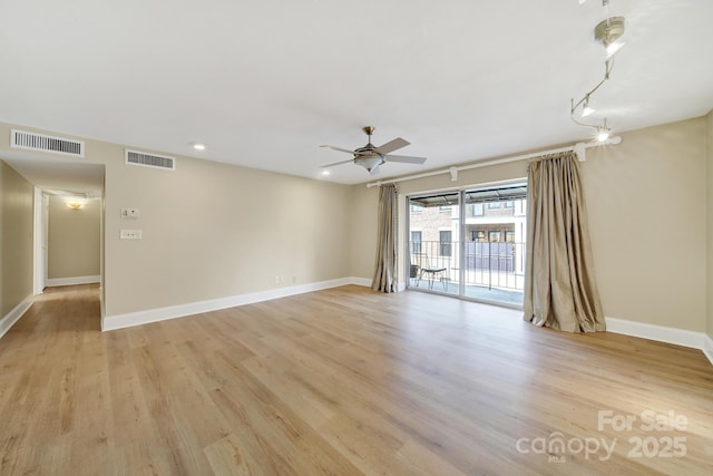 1323 Queens Rd Unit 420, Charlotte, NC 28207 - spare room featuring visible vents, ceiling fan, baseboards, and light wood-style floors
