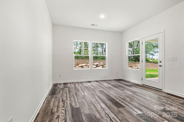 3567 Farmfield Dr, Claremont, NC 28610 - spare room featuring recessed lighting, baseboards, visible vents, and dark wood-style floors