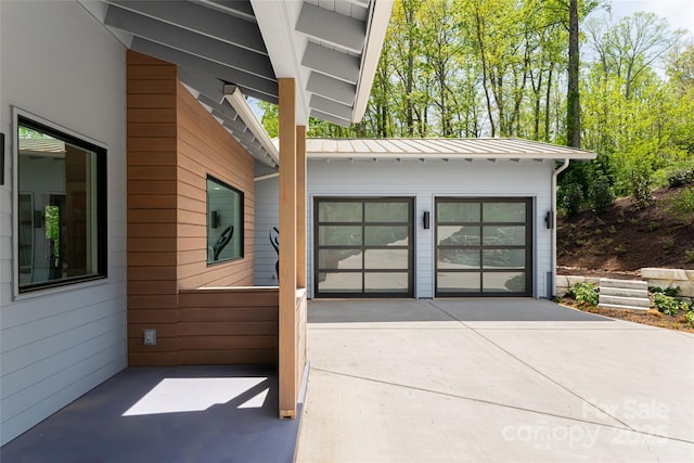 garage featuring driveway