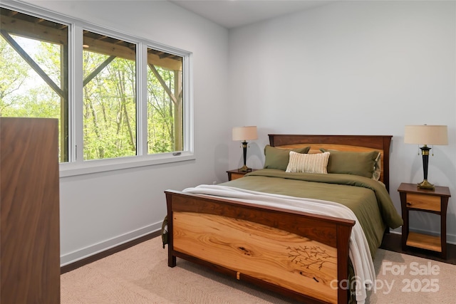 bedroom featuring baseboards