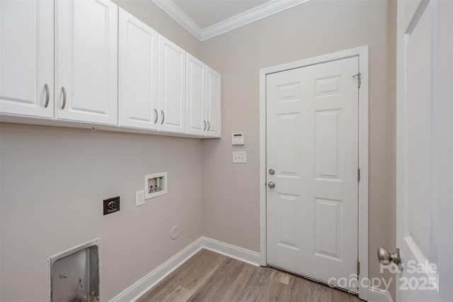 1033 Marguerite Dr, Lowell, NC 28098 - washroom with cabinet space, crown molding, washer hookup, wood finished floors, and hookup for an electric dryer
