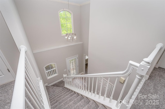 1033 Marguerite Dr, Lowell, NC 28098 - stairway featuring carpet floors, a high ceiling, and ornamental molding