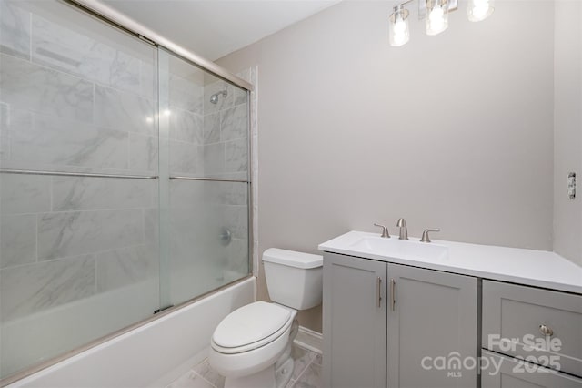 1033 Marguerite Dr, Lowell, NC 28098 - full bath featuring vanity, enclosed tub / shower combo, baseboards, and toilet