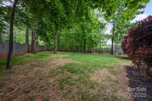 1033 Marguerite Dr, Lowell, NC 28098 - view of yard with a fenced backyard