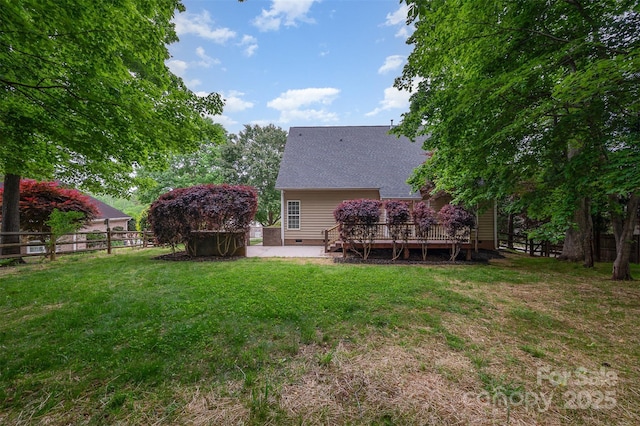 1033 Marguerite Dr, Lowell, NC 28098 - rear view of house featuring fence, a wooden deck, crawl space, a patio area, and a yard